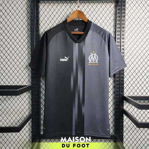 https://maisondufoot.fr/wp-content/uploads/2023/07/Maillot-Olympique-Marseille-Training-Suit-Black-2023-2024-500x500-1.jpg